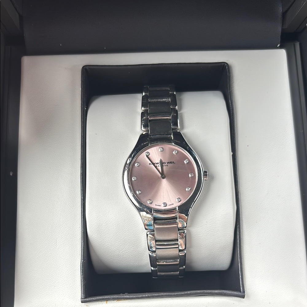 Raymond Weil Silver and Pink Watch with Sleek Design